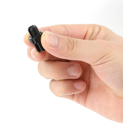 Hand holding a 10mm aluminum alloy bike brake lever adjustment screw from a 4-pack for mountain and road bikes.