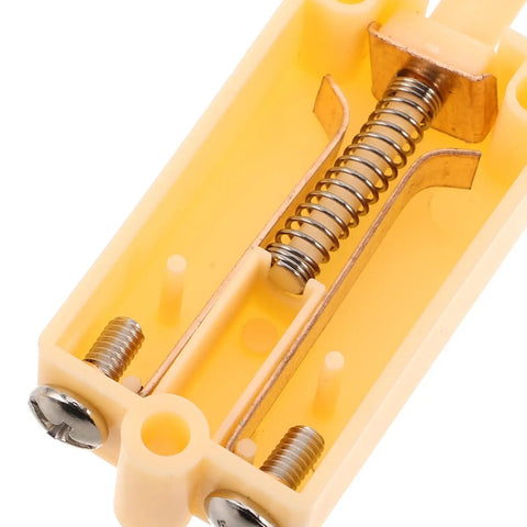 Tamper Switch For Security Cabinets With Screw Terminal Contact Sensor Plastic And Metal Enclosure Alarm For Industrial Facilities And Warehouses Alerts Unauthorized Access And Provides Easy Mounting, yellow plastic and metal spring contact close-up
