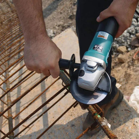 Person using Workhorse High-Power 4 1/2 Inch Angle Grinder With SJS Mechanical Clutch on metal rebar for grinding