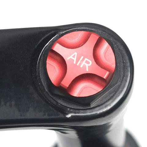Close-up of pneumatic shock air valve on Snow Mountain Bike Front Suspension Fork 26 Inch with Magnesium Alloy Exterior