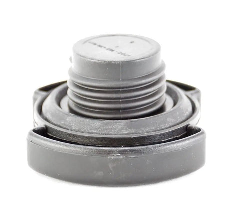 Close-up of Ford EC743 Cap Assembly Oil Filler For Engine Oil System Replacement Genuine OEM Quality Built Tough Durable Easy Install Plug And Play Fit For Ford Cars And SUVs