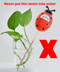 Green Soil Moisture Meter For Indoor And Outdoor Plants No Batteries Needed Easy To Read Plant Water Gauge next to a potted plant