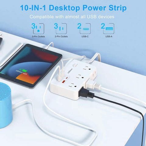 Heavy Duty Surge Protector Power Strip With Six Separated AC Outlets And Dual USB C Plus Dual USB A Ports Five Foot Extension Cord placed on a desk.