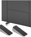 Heavy Duty Door Stop Wedge Stopper 2-Pack in zinc alloy and rubber shown in use preventing door slamming