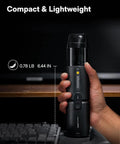 Person holding Cordless Handheld Vacuum Cleaner Four In One Air Duster And Desk Vacuum with 15000Pa suction near keyboard