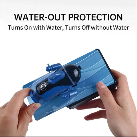Hands holding a 4 Channel RC Mini Submarine With Dual Propellers For Pool Play Featuring Dive Surface Forward Reverse Left Right Controls.