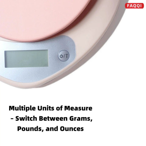 Close-up of digital kitchen scale with LCD display in pink finish, showing tare button and measurement units