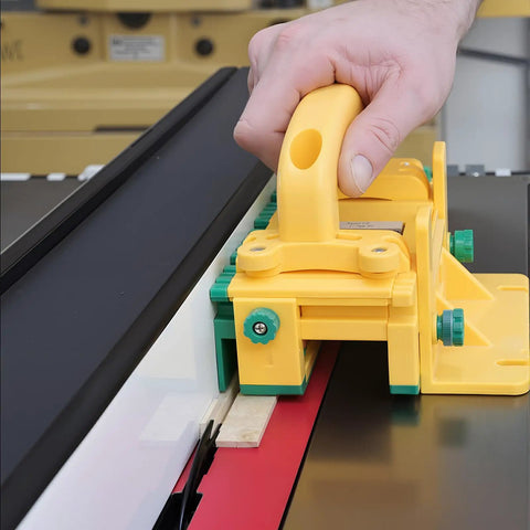 Two Piece 1/8 Inch Thin Rip Push Block Table Saw Safety Jig featuring a hand using the yellow jig near wood slabs.