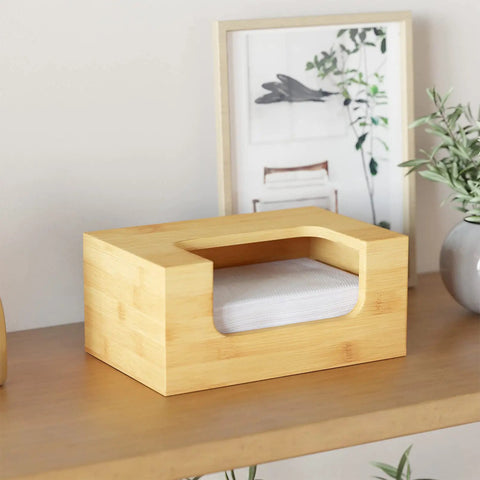 Bamboo Dryer Sheet Holder With Opening And Labels For Easy Laundry Room Organization placed on a wooden shelf with decor.