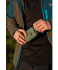 Person holding 8 Oz Insulated Wide Mouth Hip Flask With Leakproof Hinge Cap That Never Loosens Pocket Friendly Stainless Steel Liquor Container BPA Free Rust Proof On The Go Portable Design For Easy Carry And Everyday Adventures outdoors.
