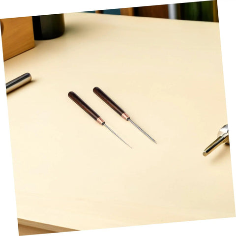 15 Piece Straight Cone Awl Set with Durable Wooden Handle for Leathercraft Sewing and Woodworking Hole Punch Projects on a work surface.