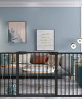 Extra Wide Baby Gate For Openings 59.84 To 62.60 Inches Large Walk Through Safety Gate For Kids Or Pets Long Pressure Mounted 60 Inch Black Fits Hallways Doorways Stairs Easy One Hand Operation, shown installed in a modern living room.