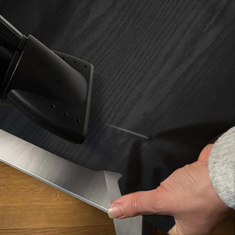 Applying Black Wood Contact Paper Peel And Stick 118 Inch By 16 Inch Waterproof Self Adhesive Wallpaper on a surface