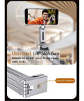 Aluminum Magnetic Phone Tripod For iPhone 12 Through 16 Pro Max Series with 1/4 inch screw mount shown holding smartphone