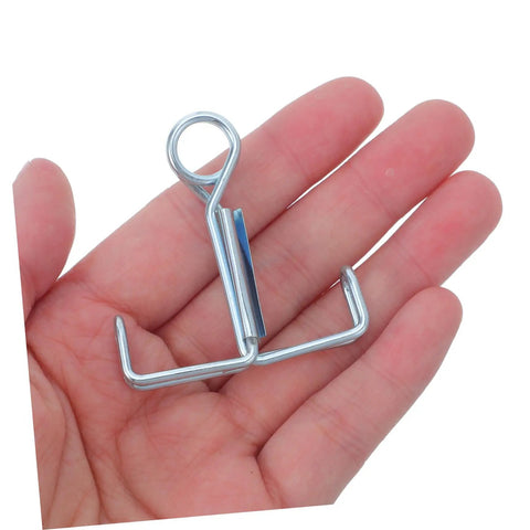 Hand holding a 25 Piece Laboratory Rubber Tube Clamps For Flow Control With Spring Loaded Latex Hose Water Stop Clips And Flat Jaw Sealing Clamps