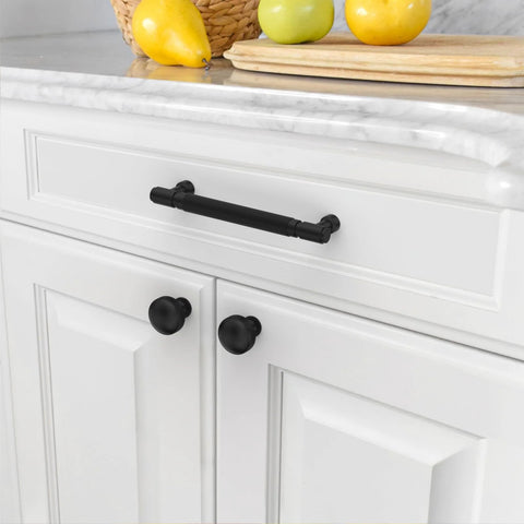 10 Pack 5 Inch Matte Black Knurled Cabinet Pulls for kitchen cabinets with modern minimalist knurling installed on white cupboard