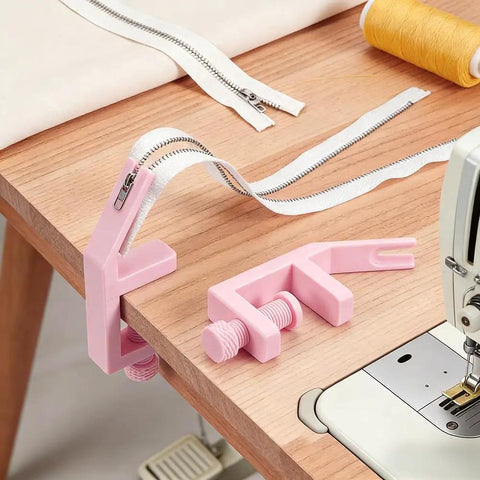 2 Pack Pink Zipper Jig Tool For Zipper Pulls Plastic Zip Slider Installing Tool Adjustable Handy Zip Fastener Jig For Dresses Pants Jackets 5.2 To 6.2 Inches Long shown on a table with zipper supplies
