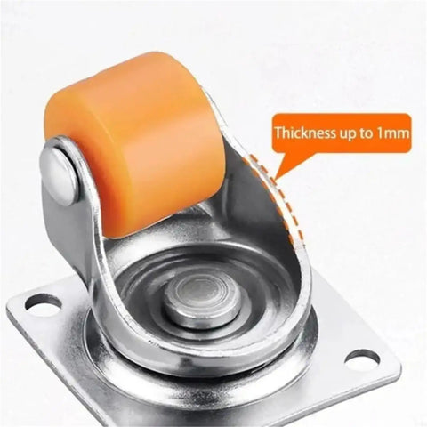 Heavy Duty Half Inch Mini Furniture Casters With Kickass Silent Glide Rubber Tires And Solid Steel Mounting Plates For Quick Home Office Upgrades And Desk Repairs close-up of orange rubber wheel on steel base plate.