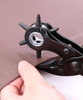 Heavy Duty Adjustable Hole Punch Pliers Kit With Revolving Leather Belt Hole Punch in use on leather material