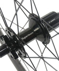 Close-up of hub on Beefy 40mm Disc Brake Road Bike Wheelset 25mm 700c U Shape Clincher Tubeless Rim 40mm Depth Six Bolt Carbon Fiber