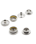 Heavy Duty Snaps And Tool Kit With Sixty Sets Of Five Eighth Inch Nickel Post And Stud Fasteners And Hand Tools For Sewing Jackets Coats Bags And DIY Crafts close-up view of nickel snaps.