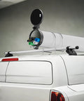 6-Inch PVC Conduit Carrier Kit With Aluminum End Caps, mounted on van roof, open showing stored conduits