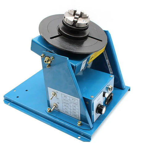3 Jaw Rotary Welding Positioner Turntable With 2.5 Inch Mini Lathe Chuck, blue metal base, compact design for pipe flanges and fittings.