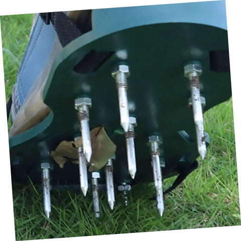 Close-up of 40 Pcs Metal Aerator Shoes Spikes For Lawn And Grass Heavy Duty Turf Aerator Stakes on footwear in use