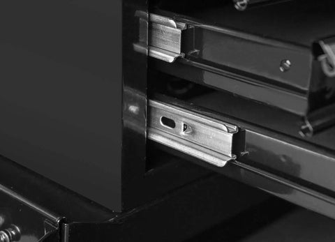 Close-up of black sturdy cold-rolled steel drawer slides in Detachable Four Drawer Tool Chest With Large Storage Cabinet And Adjustable Shelf Lockable Rolling Tool Organizer For Garage And Workshop Black Sturdy Cold Rolled Steel Construction.
