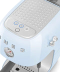 Close-up of the Totally Iconic Retro Espresso Maker With Cold Brew Feature in pastel blue, showcasing buttons and gauge.