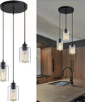 Industrial 3 Light Pendant Lighting With Adjustable 39.4 Inch Cords, Clear Glass Shade installed over a kitchen island