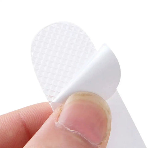 Close-up of Grippy Non Slip Bathtub And Shower Stickers Set 24 Pieces 8 By 0.8 Inch Anti Skid Treads Tape with textured surface.