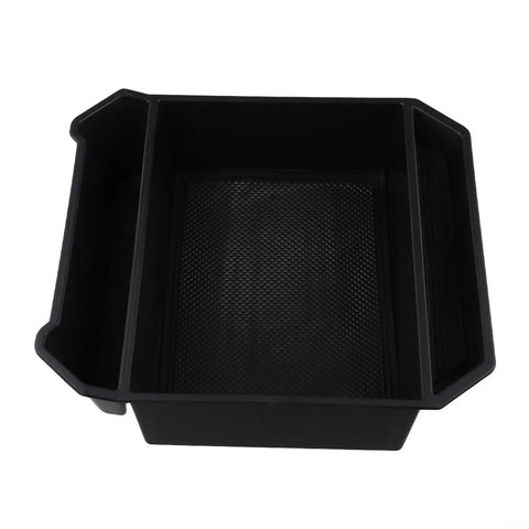 Slick Sliding Center Console Organizer Tray For Tesla Cybertruck 2024 And Up Models Black deep storage compartment with mesh base.