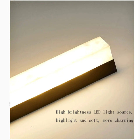 Modern LED Wall Sconce Dropping Chill Ambient Glow With 3000K Up And Down Illumination Top Shelf Build for bedroom with soft lighting.