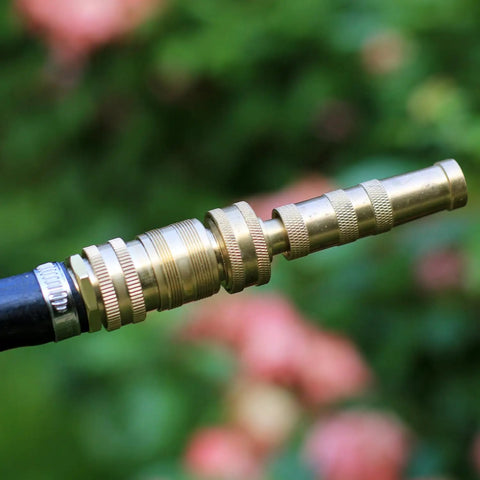 Close-up of Solid Brass Garden Hose Quick Connect Fittings Three Quarter Inch GHT Internal Thread, Female and Male Adapters