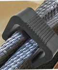 Hella Secure 50 Pack Rattan Wicker Furniture Connectors Heavy Duty Plastic Patio Chair Clips close-up of black clip holding wicker strands.
