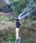 Rotary Oscillating Irrigation Sprinkler Nozzle For Farm Crops Adjustable Spray Radius 6 To 9 Meters in action