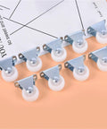 Six Piece Pack Of One Inch Universal Furniture Casters In Bright White Impact Resistant Nylon With Heavy Duty One Way Plate Mount for smooth rolling.