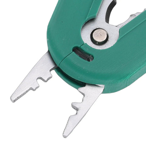 Close-up of Mavaol Compact Wire Stripper Tool's sharp steel cutting edges and ergonomic green handle.