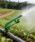 Turbine Vortex Sprinkler For Lawn And Farm Irrigation 360 Degree Rotating Spray Gun in green spraying water over crops