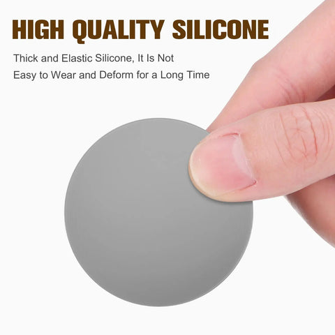 Silicone Door Stopper Bumper Pads With Strong Adhesive, close-up of a grey pad held by fingers, highlighting quality material.