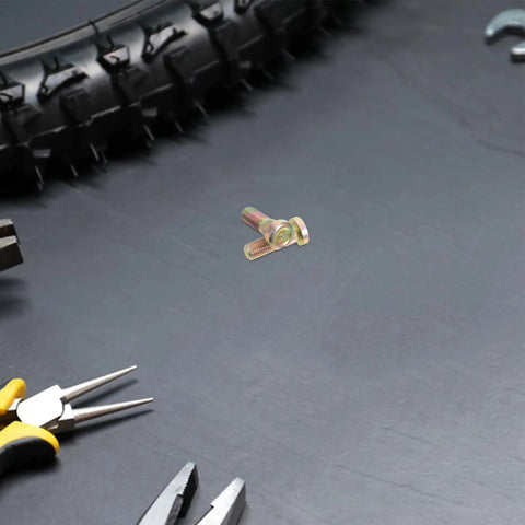 Secure Your Wheels With These 2 Pack M10 Wheel Lug Bolts Metal Studs Heavy Duty Replacement Hub Screws on workbench with tools.