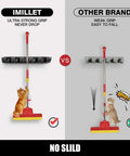 Comparison between 'IMILLET' and 'Other Brand' wall-mounted mop holders, showing a cat testing strength; IMILLET has better grip.