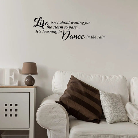 Living room with sofa and lamp featuring inspiring quotes wall decals peel and stick vinyl stickers for living room bedroom office and bathroom motivational decor large 12 to 14 inch panels to elevate any space with feel good vibes.