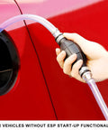 Top Shelf Manual Fuel Transfer Pump With Thick Rubber Bulb And Metal Body shifts fluids into a red vehicle fuel tank.