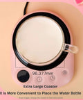 Always Keep Your Daily Grind Nice And Toasty With This Electric Coffee Mug Warmer Featuring Five Heat Settings Plus A Sleek Touch Pad Auto Shut Off Keeps Your Office Setup Secure, featuring a top view of a large pink coaster with a cup.