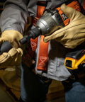 Worker using NRHDA Hex Quick-Change Socket Adapter For NRHD, 7/16-Inch, Rust-Resistant Black Finish, Impact Socket Compatible