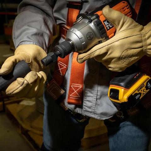 Worker using NRHDA Hex Quick-Change Socket Adapter For NRHD, 7/16-Inch, Rust-Resistant Black Finish, Impact Socket Compatible