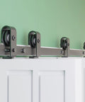 Bi-Folding Sliding Barn Door Hardware Track Kit 72 Inch For Four Doors In Black Finish, Heavy-Duty 330 Lb Capacity, installed view