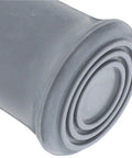 Close-up of a rubber foot cap from Non Slip Shower Chair Feet Replacement Kit 8 Pack Durable Rubber Foot Caps For Bath Stools And Benches Easy Slip On Fit Protect Floors Stabilize Seating And Comfort For Walking Aids showing circular grooves.
